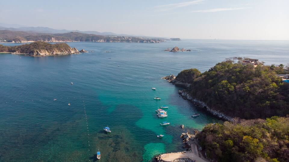Bahía de Huatulco La Entrega, Oaxaca Mexico, aerial photography with drone. blue colored beach