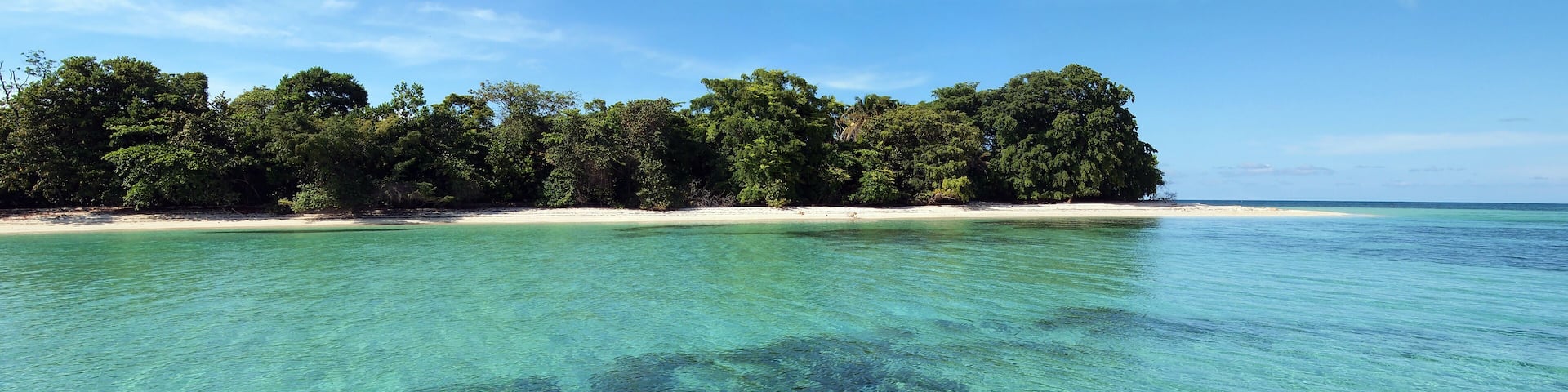 Panoramic view of a pristine island with white sandy beach and clear water, Caribbean sea, cayos Zapatilla, Bocas del Toro, Panama