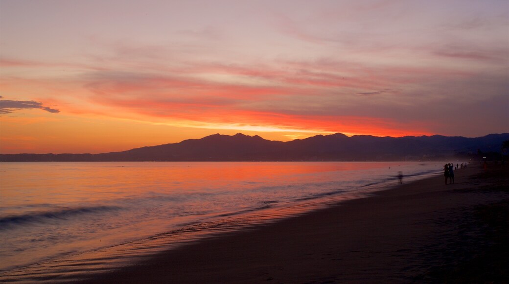 Nuevo Vallarta Beach showing general coastal views, a sandy beach and a sunset