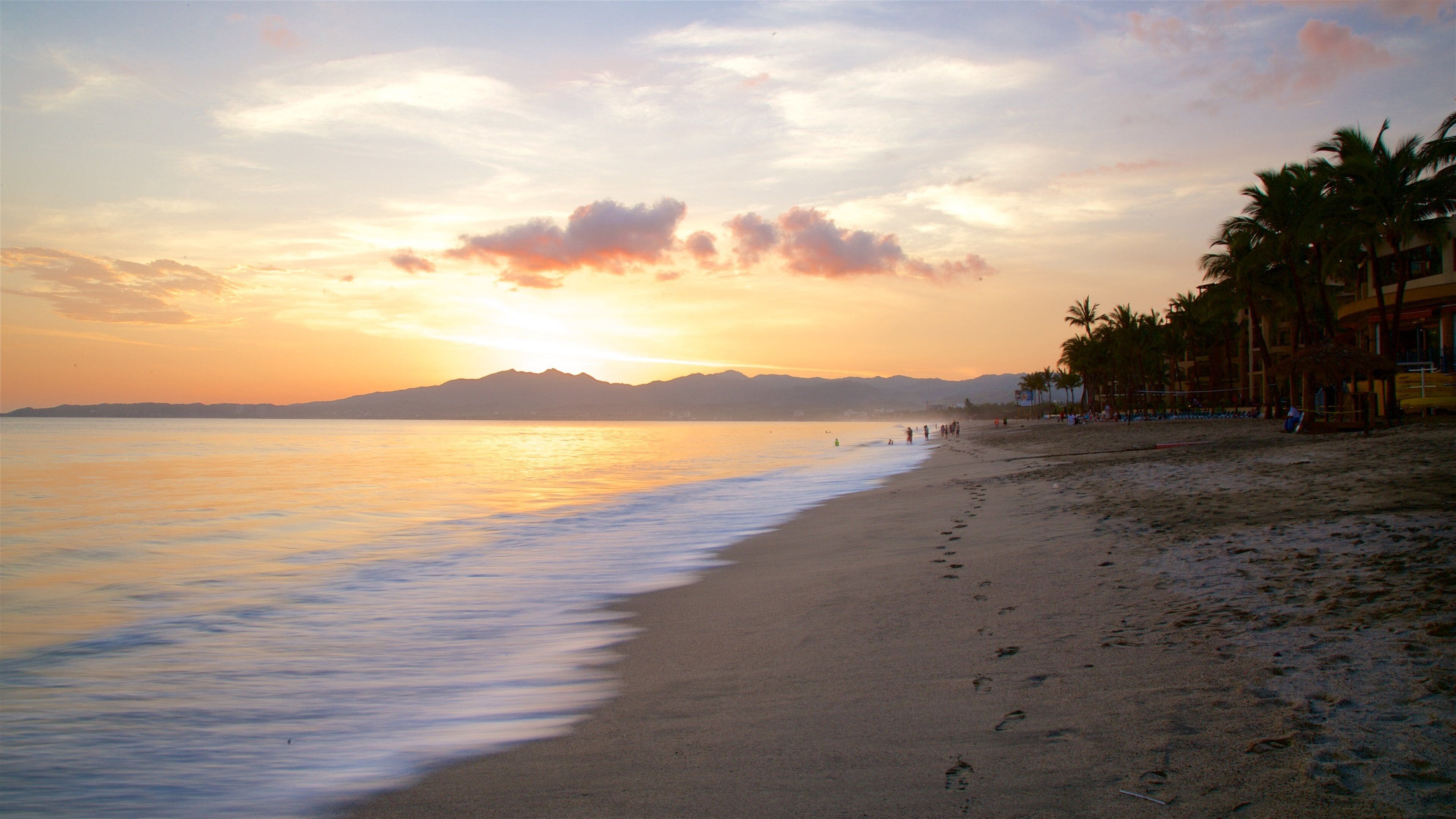 Nuevo Vallarta-stranden som viser tropisk landskap, solnedgang og sandstrand