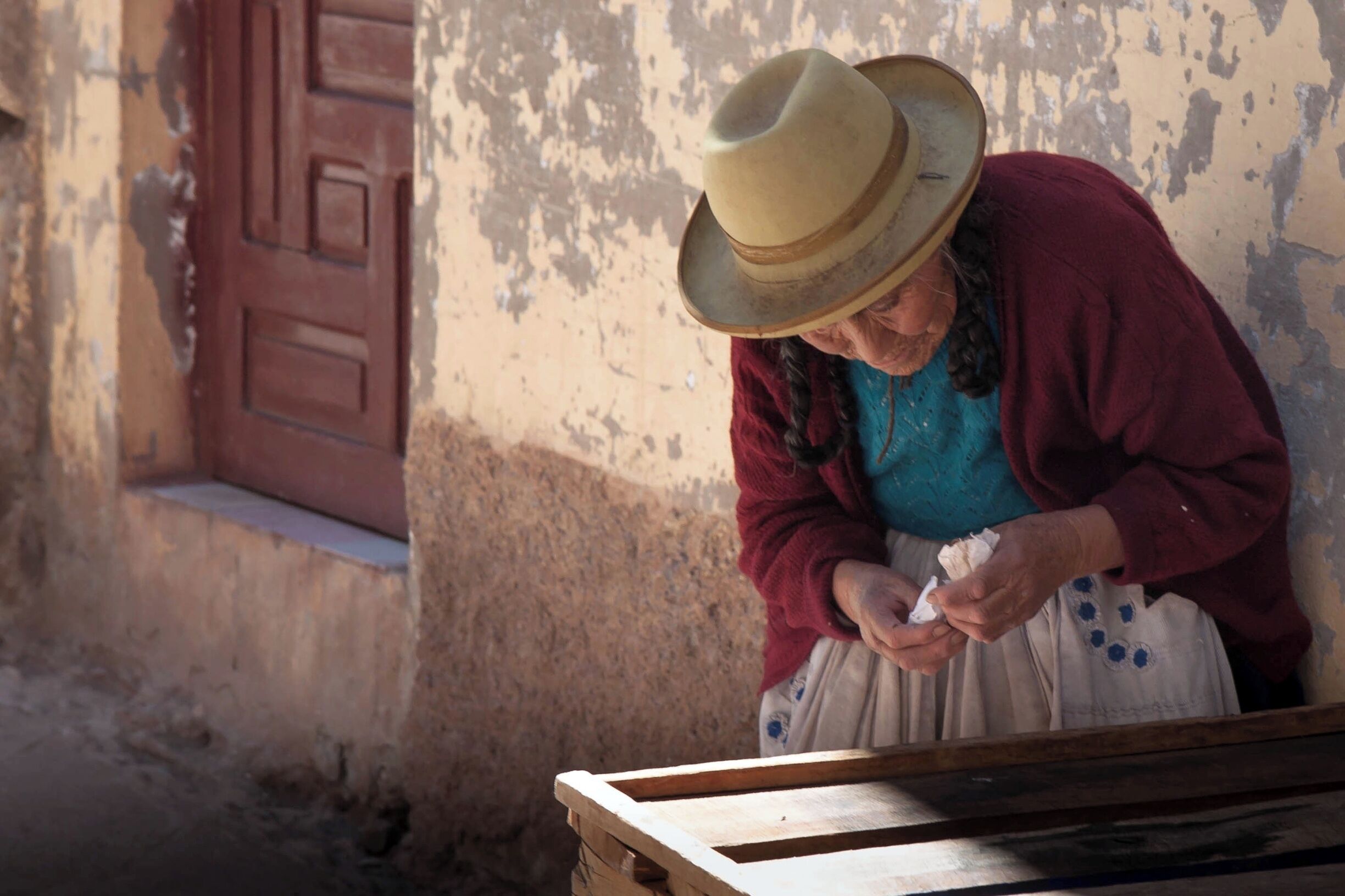 Woman on the street of Andahuaylillas, a town in Peru's highlands.