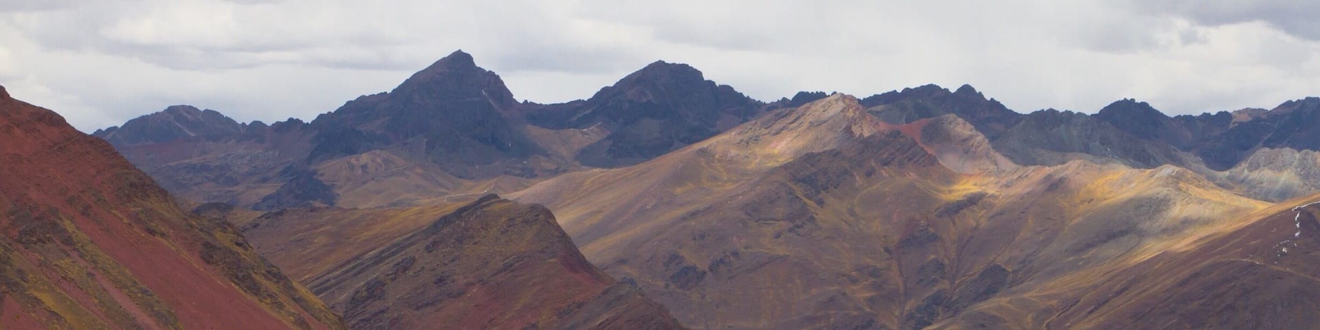 A rugged mountain range with a valley.