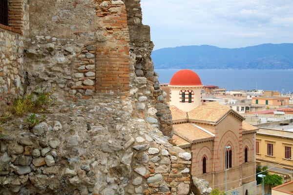 Aragonese Castle featuring a coastal town and heritage elements