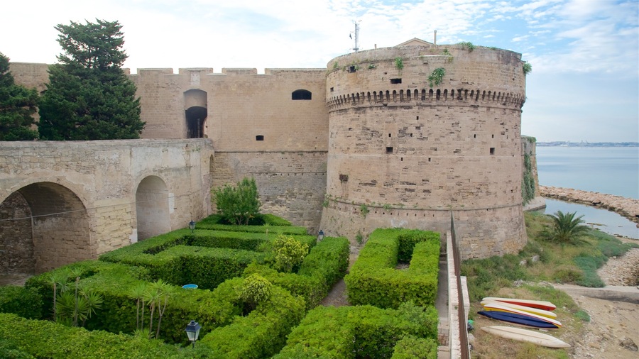 Aragonese Castle showing a castle, a garden and general coastal views