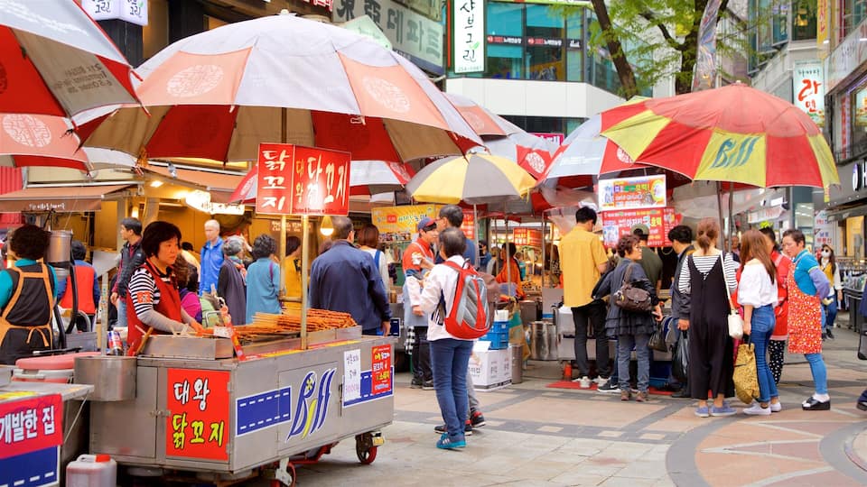 BIFF Square which includes markets and food as well as a small group of people