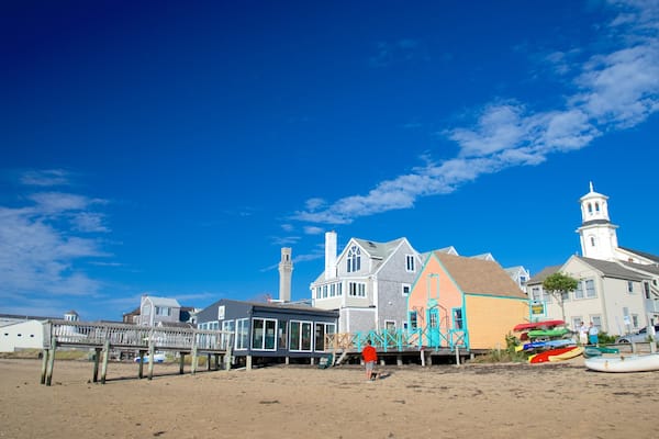 MacMillan Pier featuring a sandy beach and a coastal town