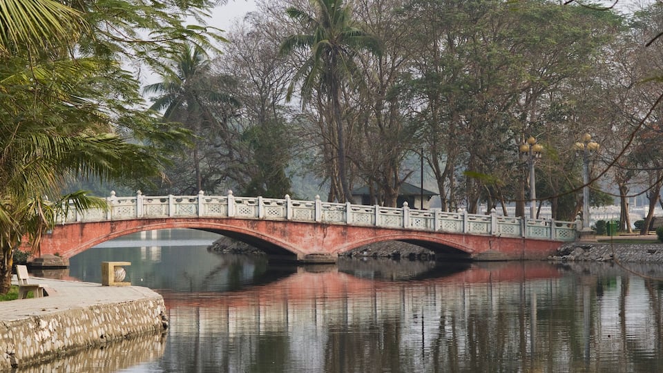 Bridge over the lake Ho Bay Mau in the Thong Nhat park in Hanoi, Vietnam