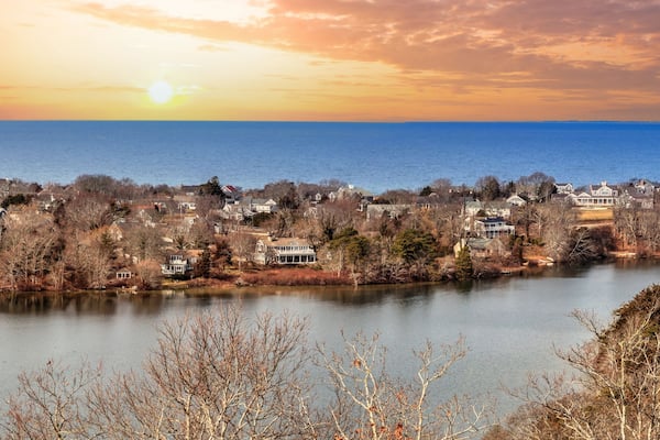 Skyline view of sunrise over Scargo lake and the ocean from the Scargo Tower in Dennis