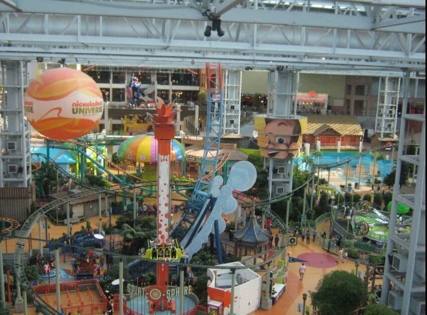 A Nickelodeon Universe indoor theme park with various rides and attractions.