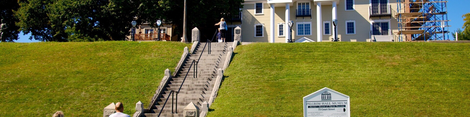 Pilgrim Hall Museum which includes signage as well as a couple