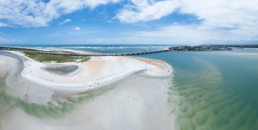 Aerial view of abstract panorama of crescent beach at low tide, St. Augustine, United States.