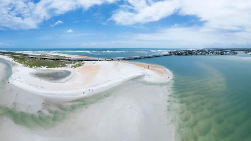 Aerial view of abstract panorama of crescent beach at low tide, St. Augustine, United States.
