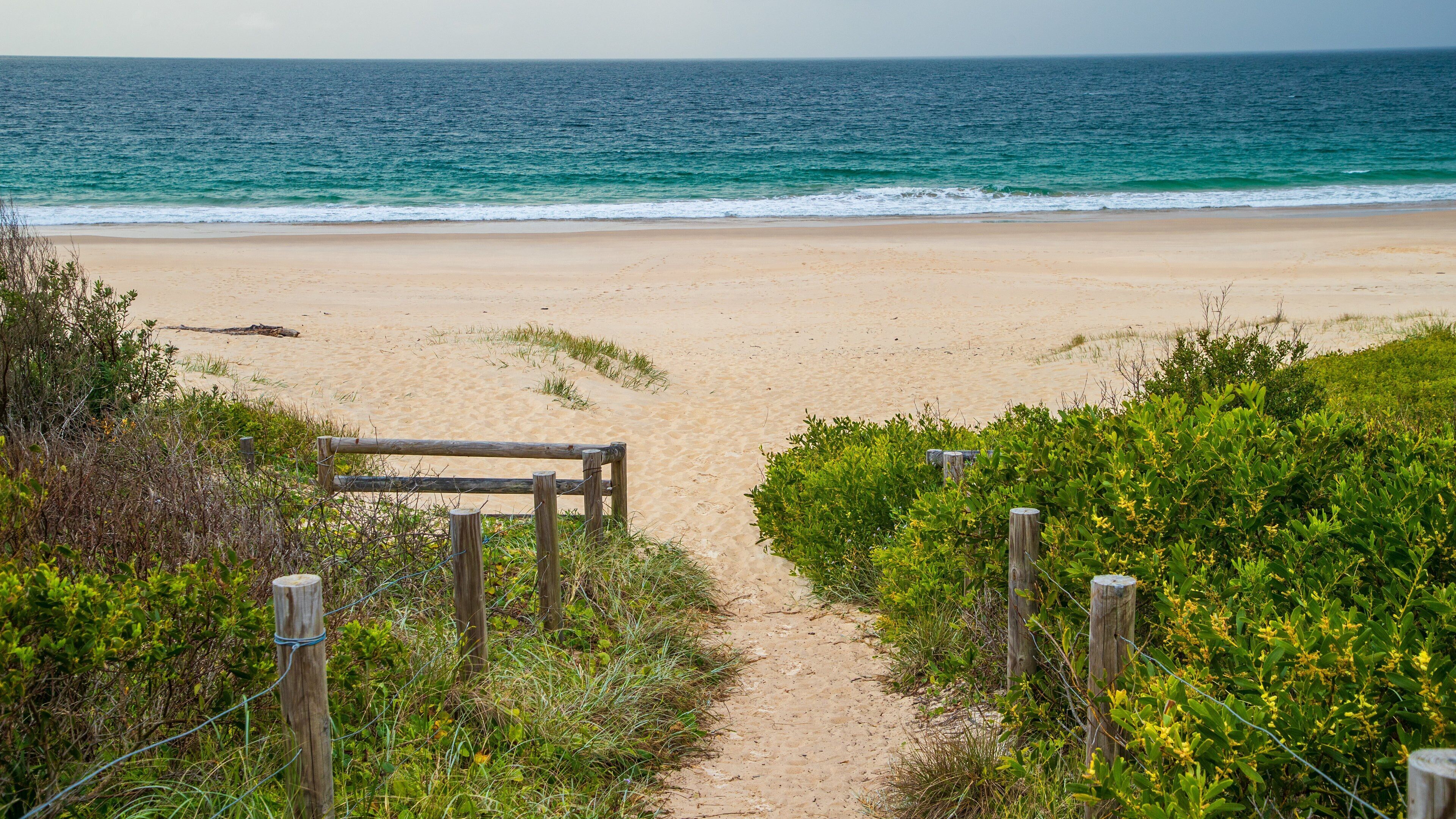 Tomaree National Park which includes a beach and general coastal views