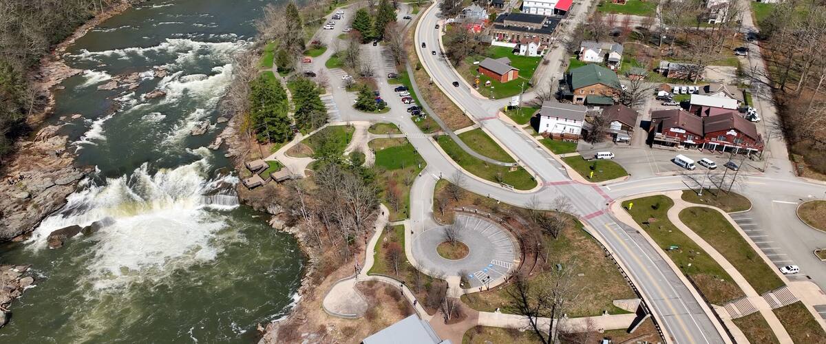 Ohiopyle state park beside Youghiogheny River and Ohiopyle State Park with whitewater rapids waterfall visitor center and park with tourist