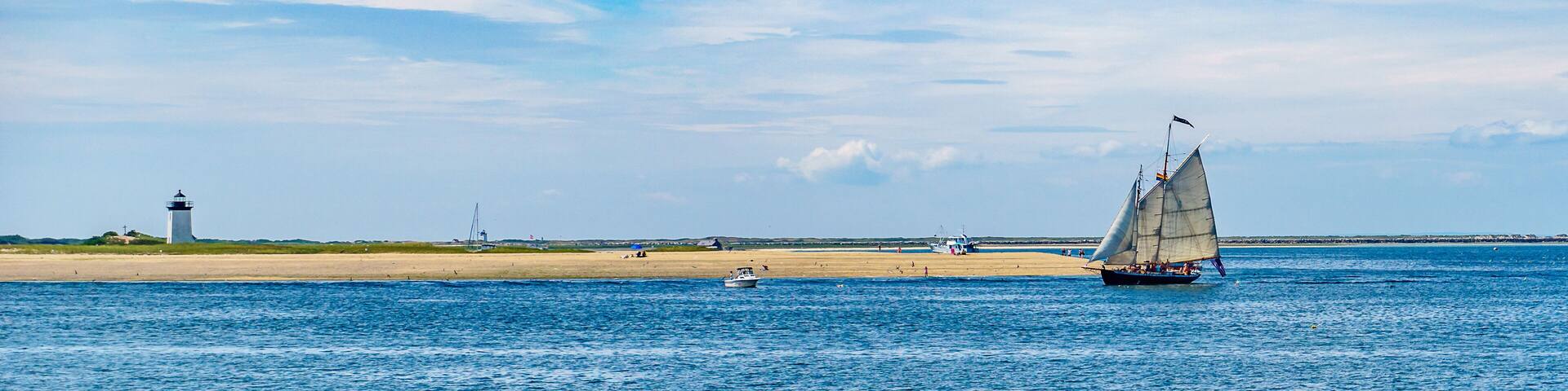 wo-masted yacht and Beautiful landscape of ocean beach Cape cod Massachusetts