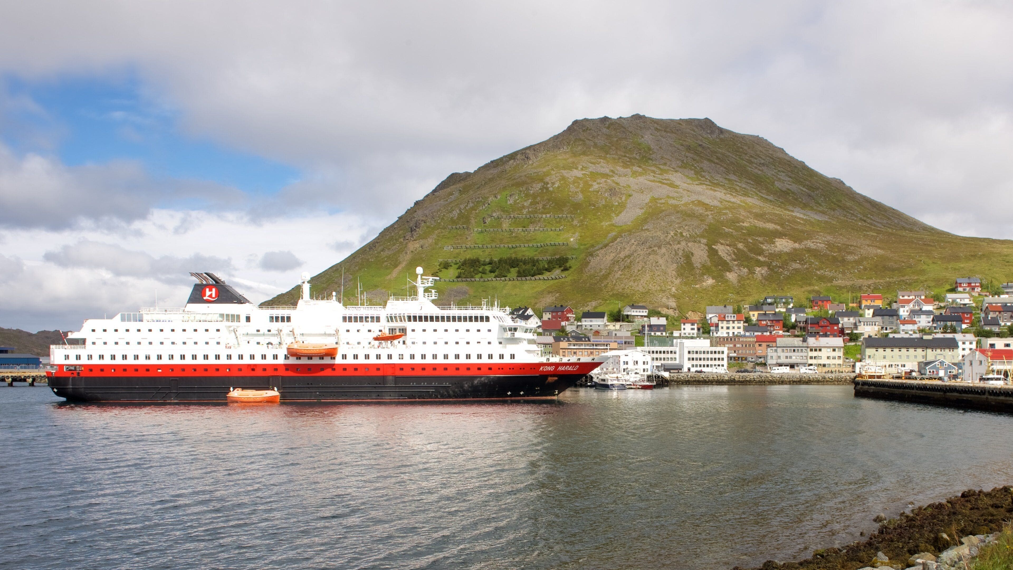 Honningsvag Port which includes mountains, a small town or village and cruising