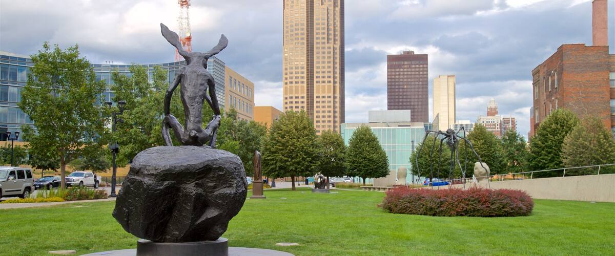 John and Mary Pappajohn Sculpture Park featuring outdoor art, a city and a park
