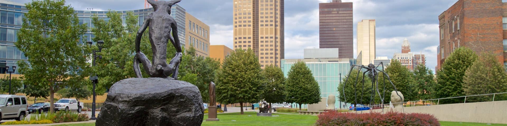 John and Mary Pappajohn Sculpture Park featuring outdoor art, a city and a park