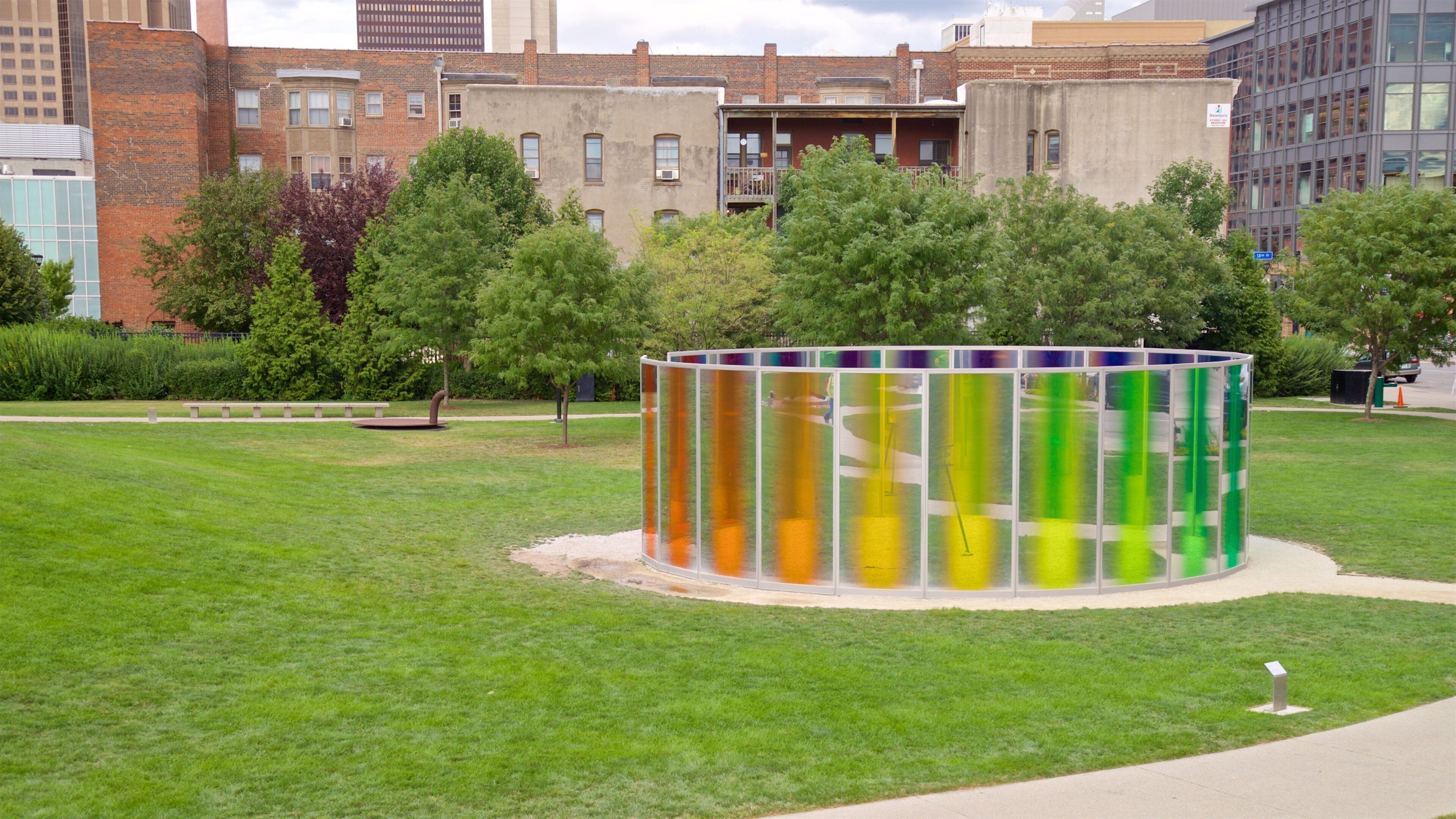 John and Mary Pappajohn Sculpture Park featuring a park, outdoor art and a city