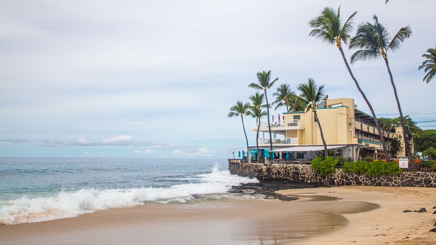 Magic Sands Beach which includes a sandy beach, a coastal town and general coastal views