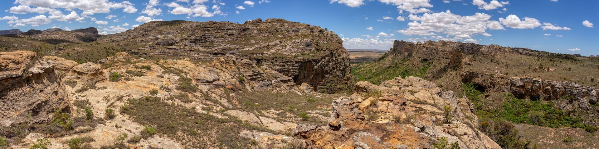 Isalo National Park in Ihorombe Region. Wilderness landscape with water erosion into rocky outcrops, plateaus, extensive plains and deep canyons. Beautiful Madagascar panorama landscape.