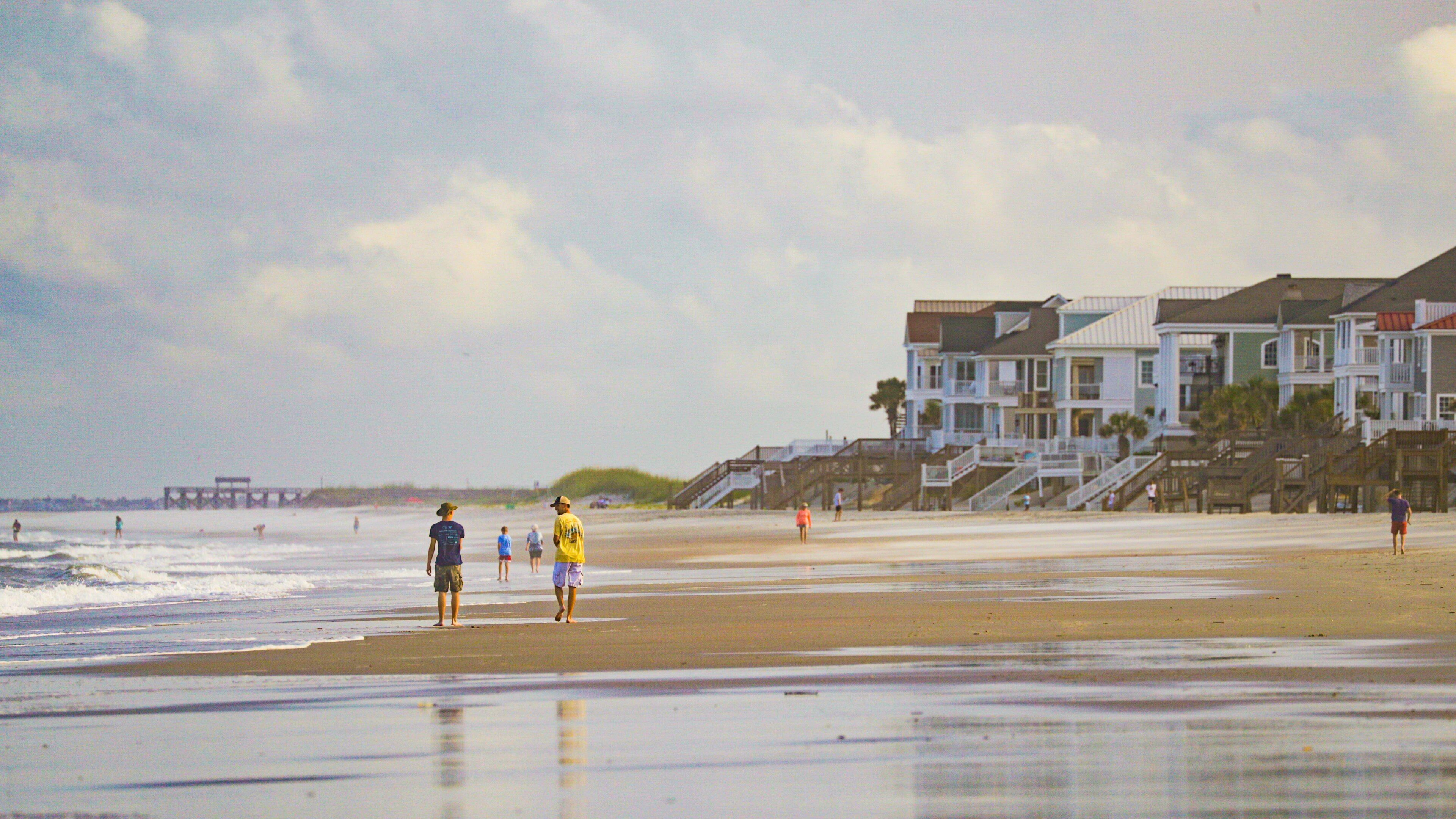 Litchfield Beach which includes a beach, a coastal town and general coastal views