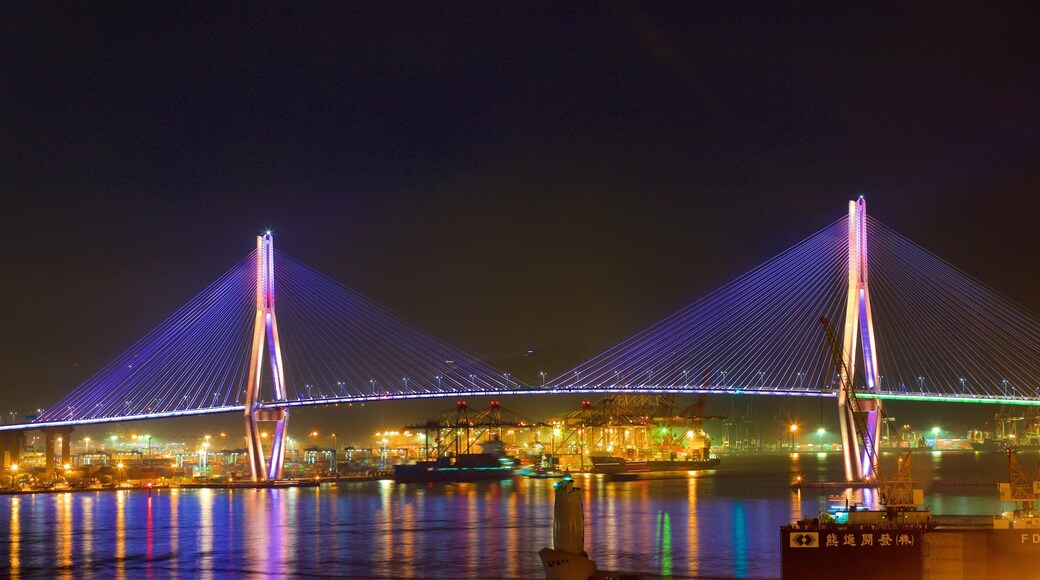 Jung District which includes night scenes, a river or creek and a bridge