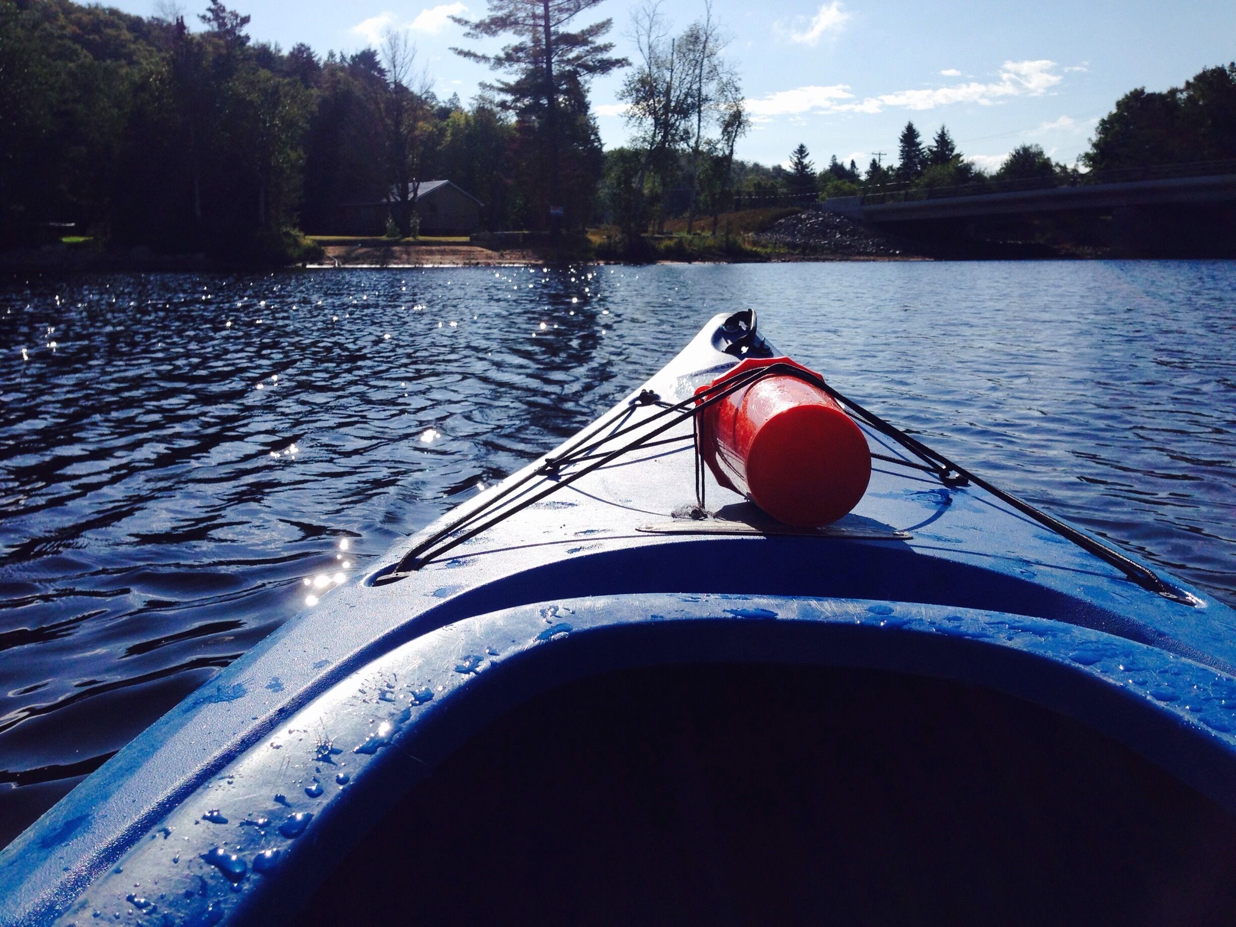 Early morning Kayaking on Oxtongue Lake in the Algonquin Highlands.