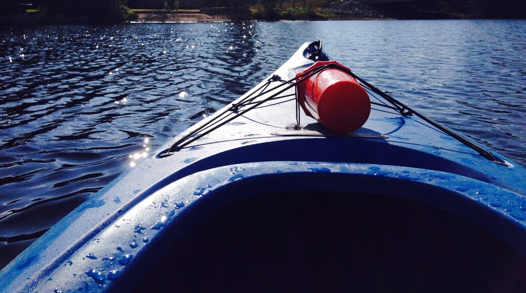 Early morning Kayaking on Oxtongue Lake in the Algonquin Highlands.