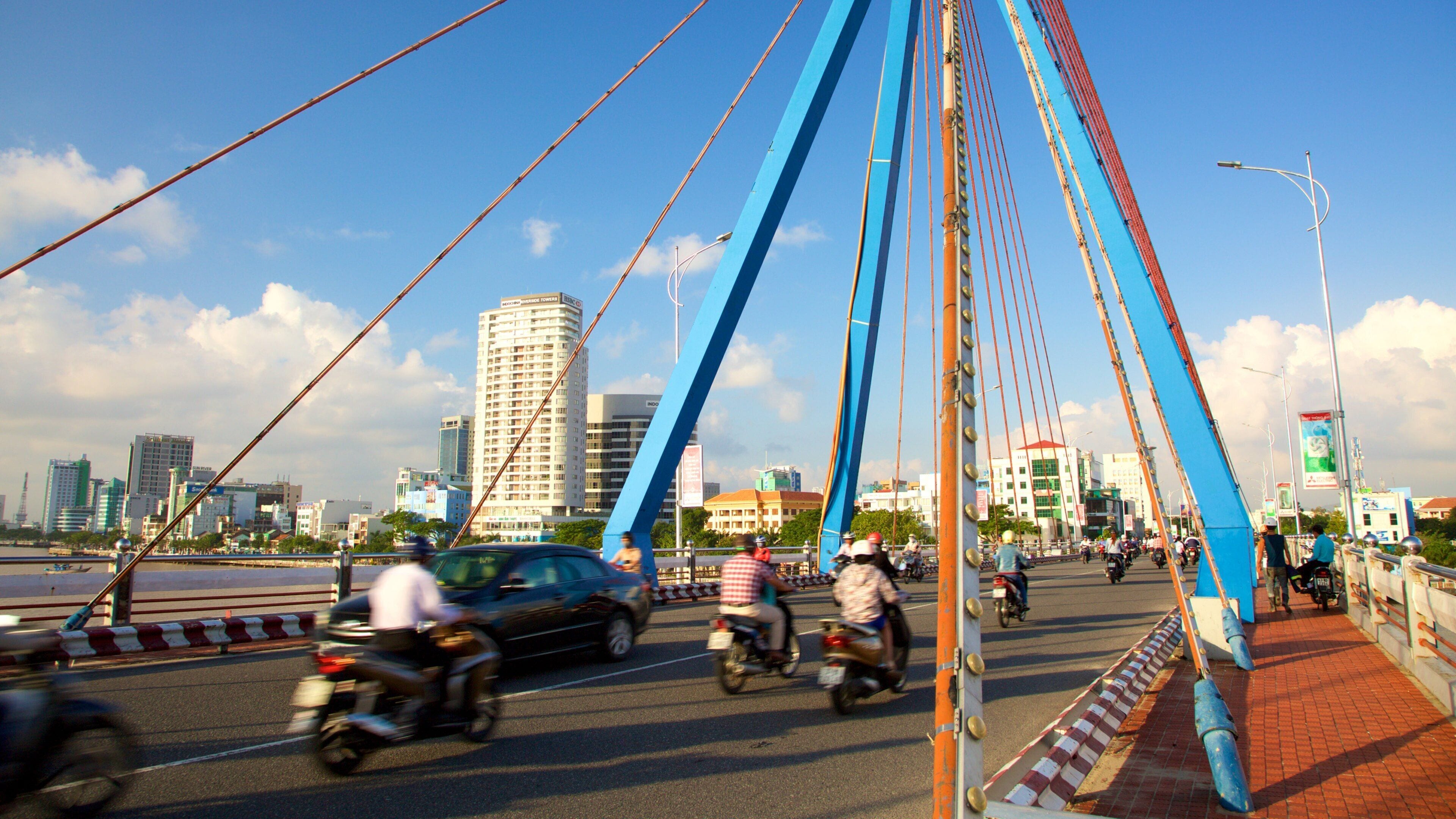 Han River Bridge which includes a city, a bridge and motorcycle riding
