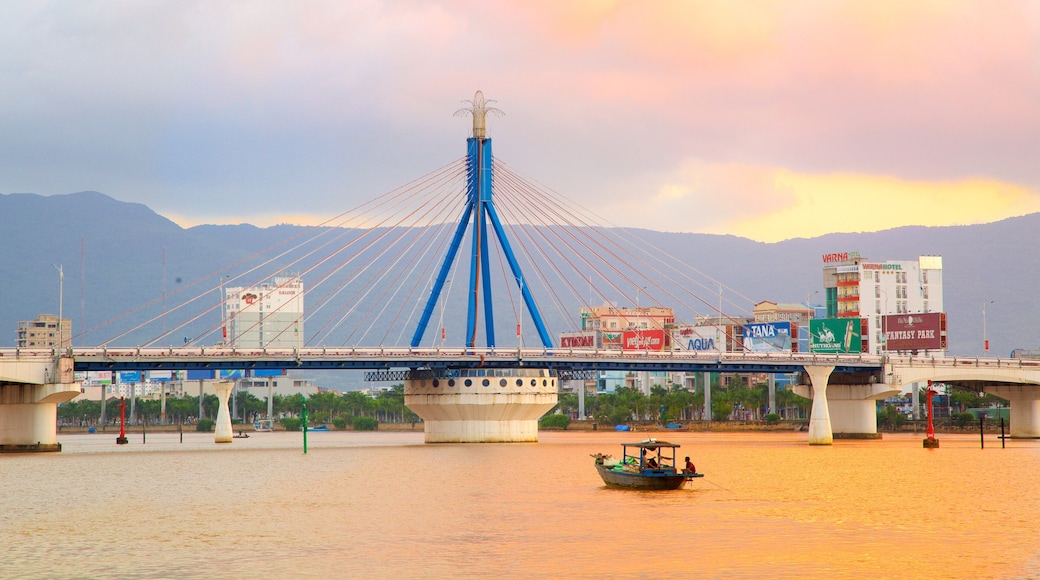 Han River Bridge which includes a sunset, boating and a river or creek
