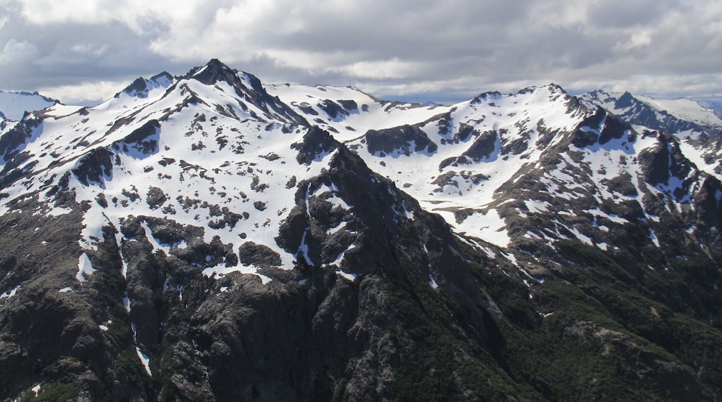 Beautiful snow packed mountains of Patagonia. Patagonia, the rugged ice fields of Argentina offer some of the best hikes I have ever been on in my entire life. Some are a bit challenging, like this one in Bariloche. This hike began by a pristine lake, Gutierrez, then up to Cerro Frey. From Cerro Frey we had to cross a steep snowy pass and it is definitely harder than it looks. Hard, but rewarding.
#ARGENTINA #HIKING #OUTDOORS #PATAGONIA