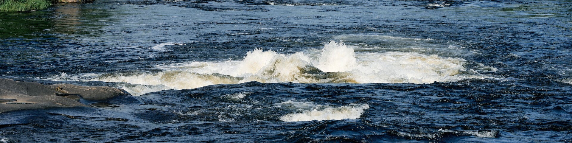 Etna River by the Møllerstufossen Waterfalls in Nordre Land, Oppland, Norway.