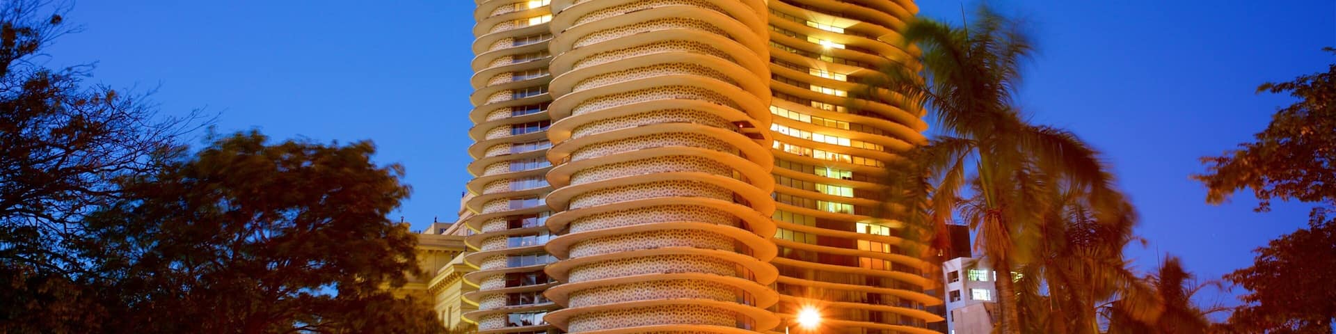Niemeyer Building showing night scenes and a high rise building