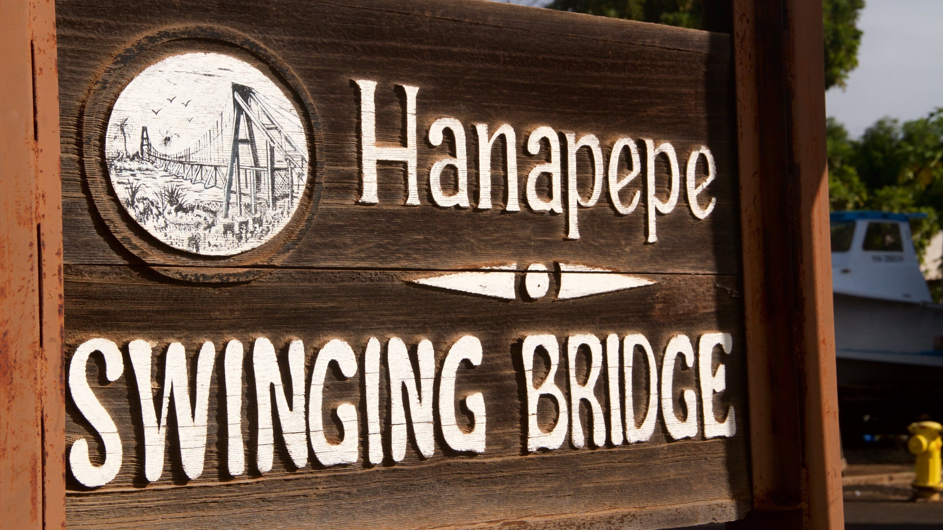 Hanapepe Swinging Bridge which includes signage