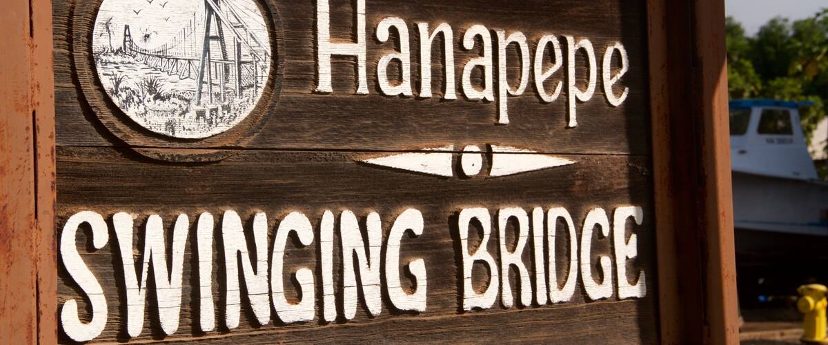 Hanapepe Swinging Bridge which includes signage