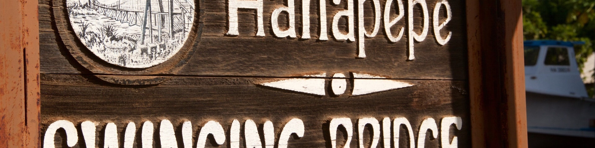 Hanapepe Swinging Bridge which includes signage