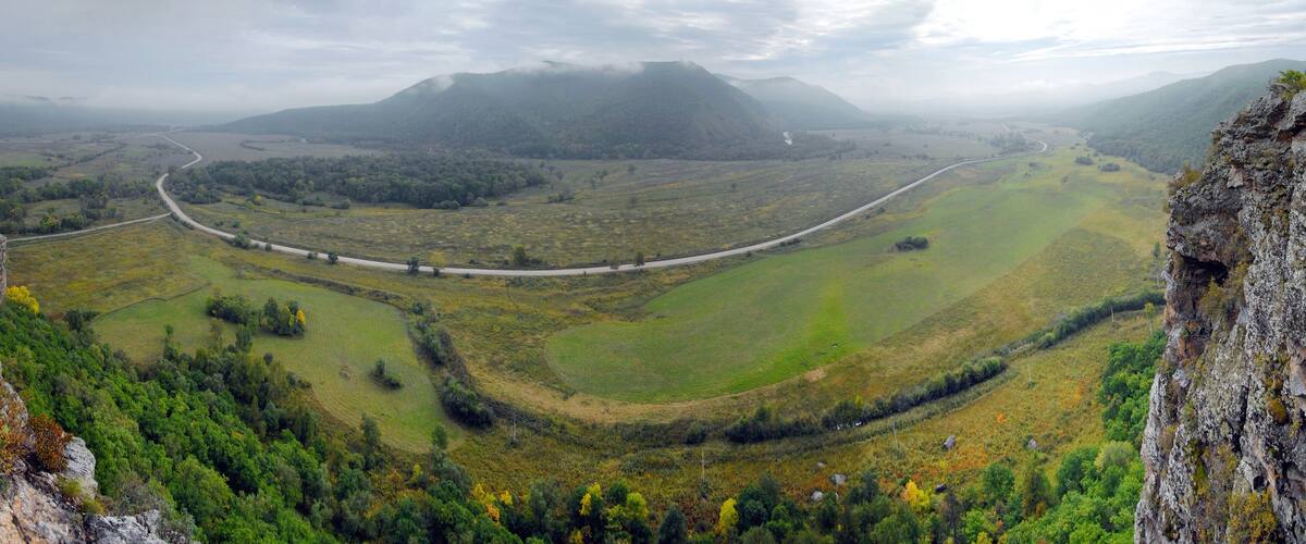 Mountainous landscape. View at Ussuri river valley and road Kavalerovo - Arseniev. Primorsky Krai (Primorye), Far East, Russia.