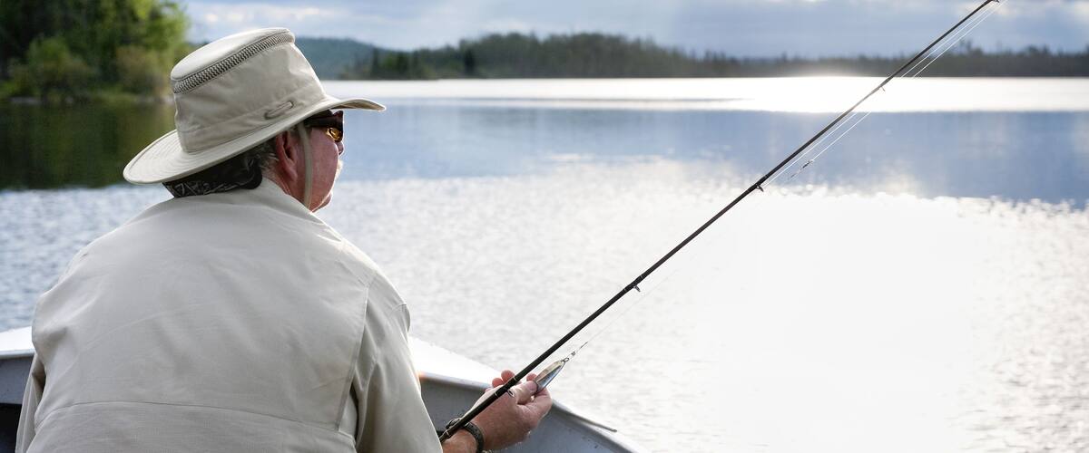 Man Fishing, Otter Lake, Missinipe, Saskatchewan, Canada