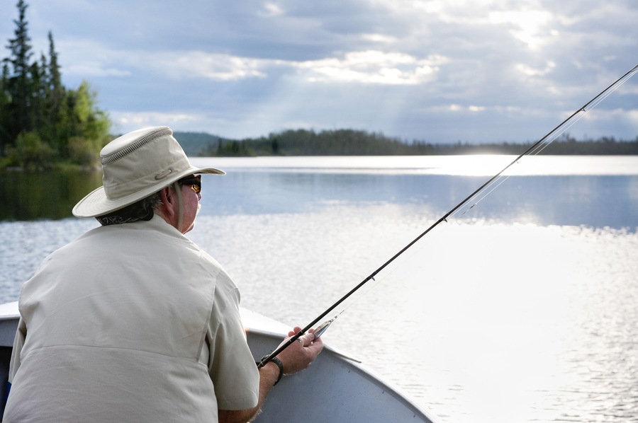 Man Fishing, Otter Lake, Missinipe, Saskatchewan, Canada
