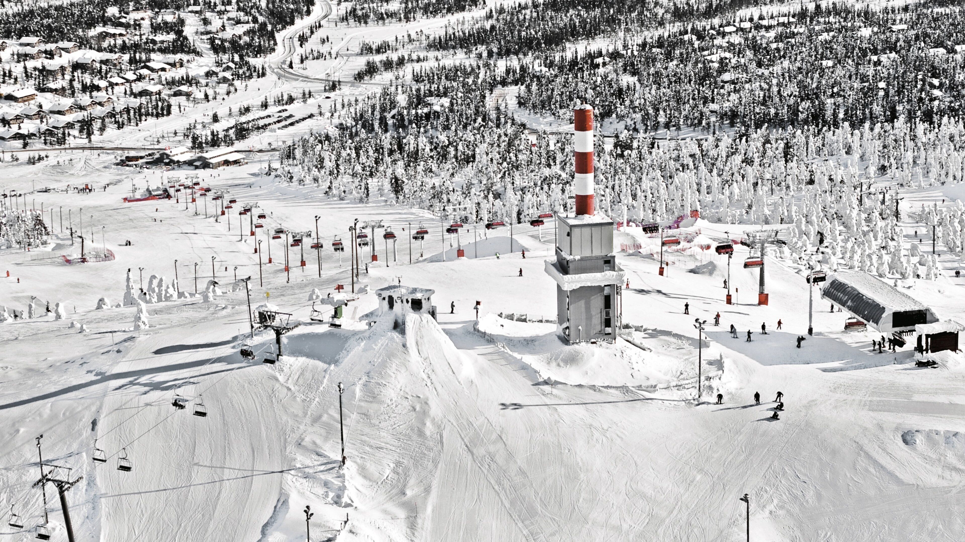 Ruka Ski Area showing snow and forest scenes