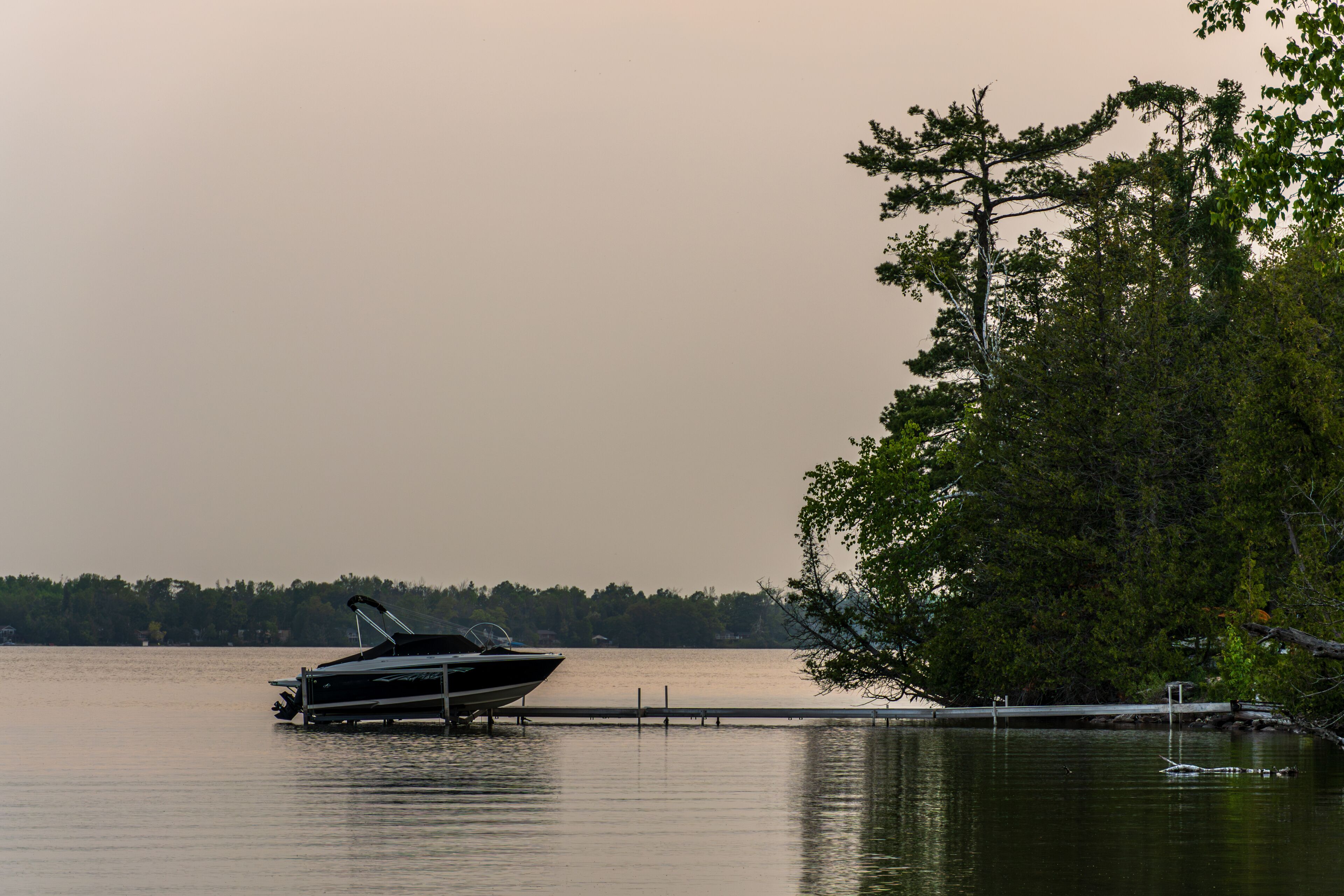 Early of a cloudy, spring morning on Bass Lake. in Simcoe County