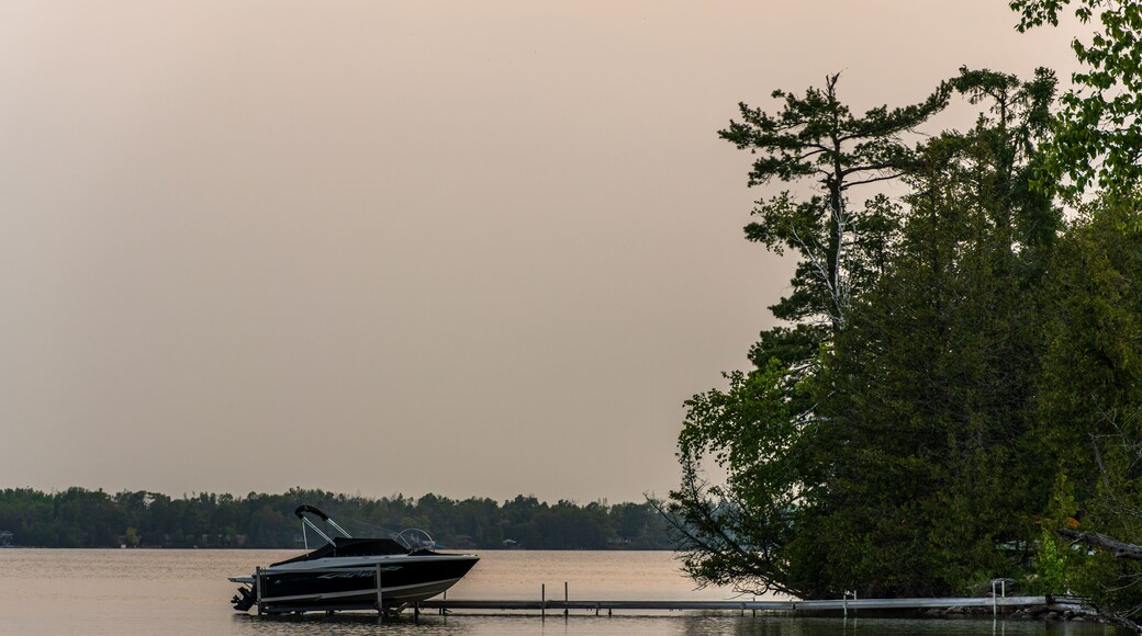 Early of a cloudy, spring morning on Bass Lake. in Simcoe County