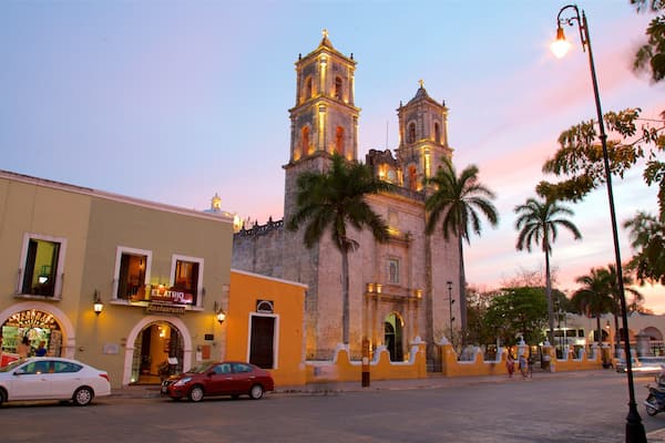 Cathedral of San Gervasio showing heritage architecture, a church or cathedral and a sunset