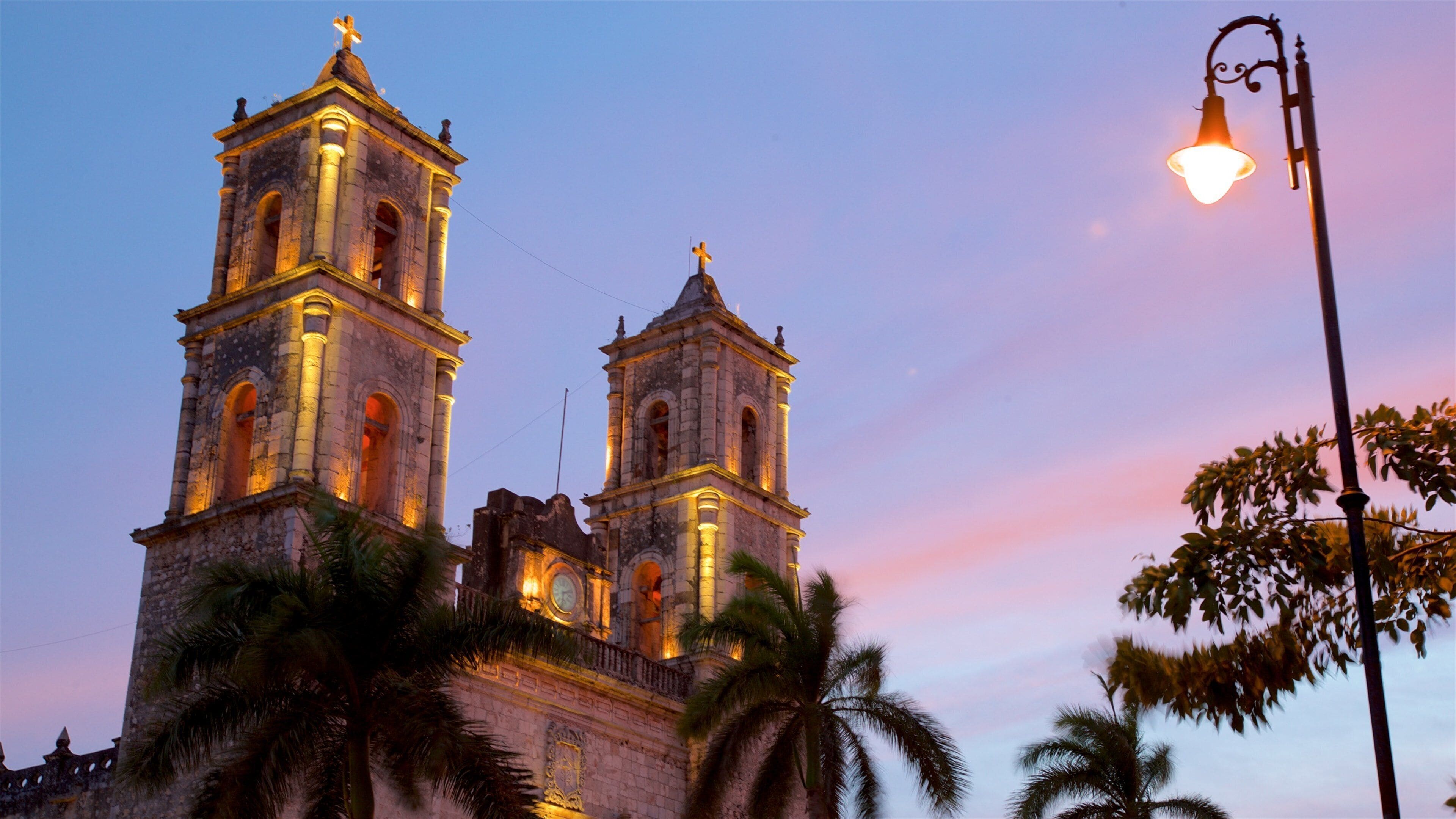 Cathedral of San Gervasio showing heritage elements and a sunset