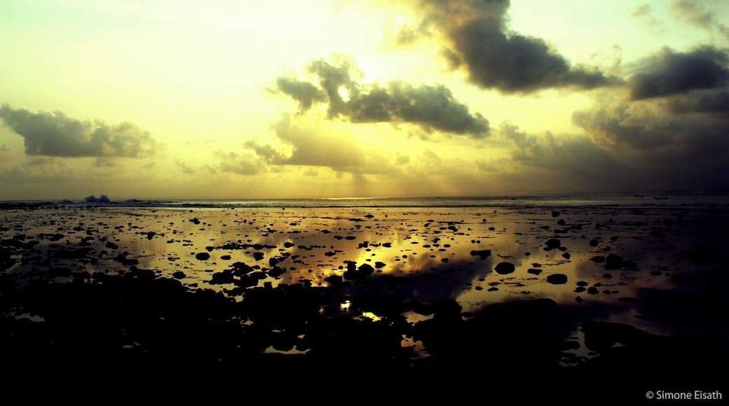 Sunset over White Beach in Pangandaran, Java, Indonesia