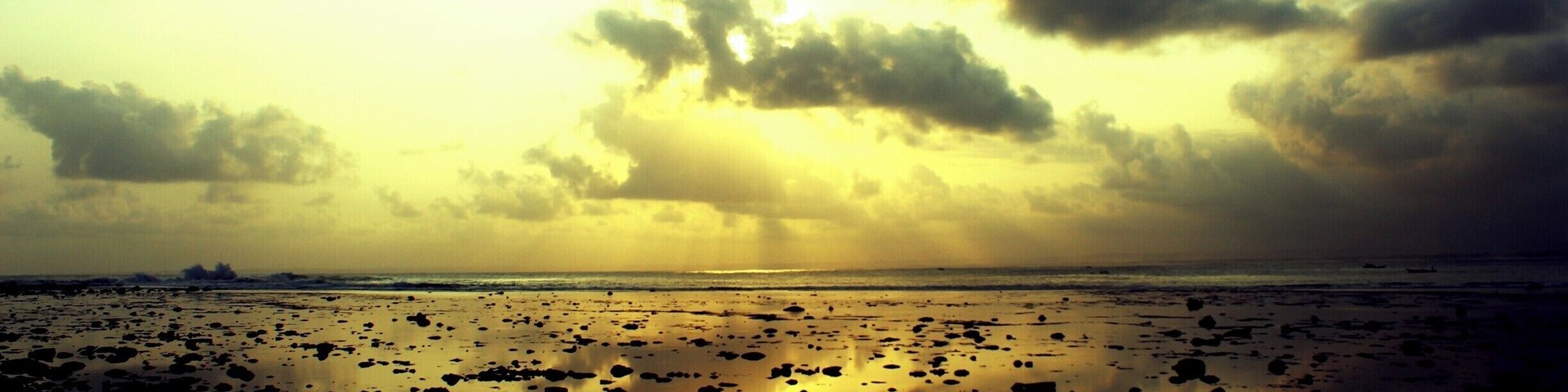 Sunset over White Beach in Pangandaran, Java, Indonesia