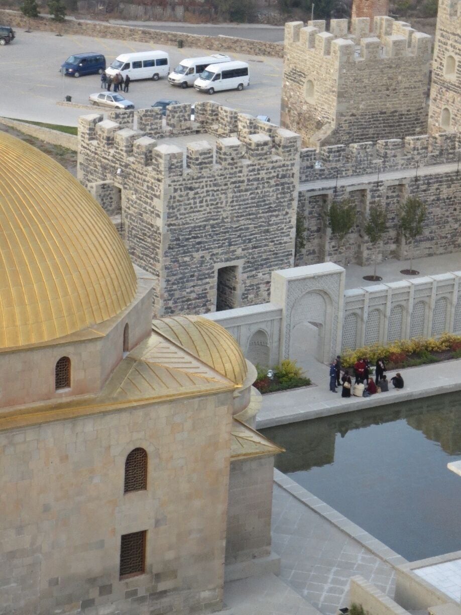 Looking down at some tourists in the courtyard of the Rabati Fortress, near the city of Akhaltsikhe, Georgia.

This is a fortress that was important in the Ottoman era.