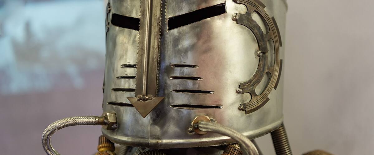 Cherepovets, Russia May 22, 2021 A figure of an iron man - a robot on display at a metallurgical museum, assembled from iron sheets by an experienced welder.