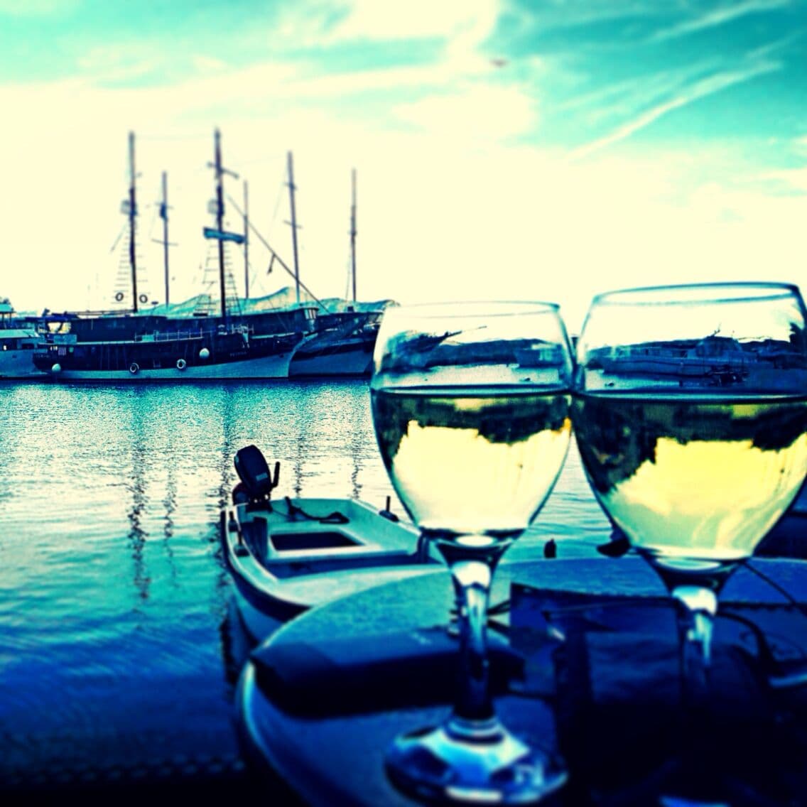 Sipping wine port side in Trstenik, Croatia with our sail boats in the background. Probably the best wine of my life in this small little town! #croatia